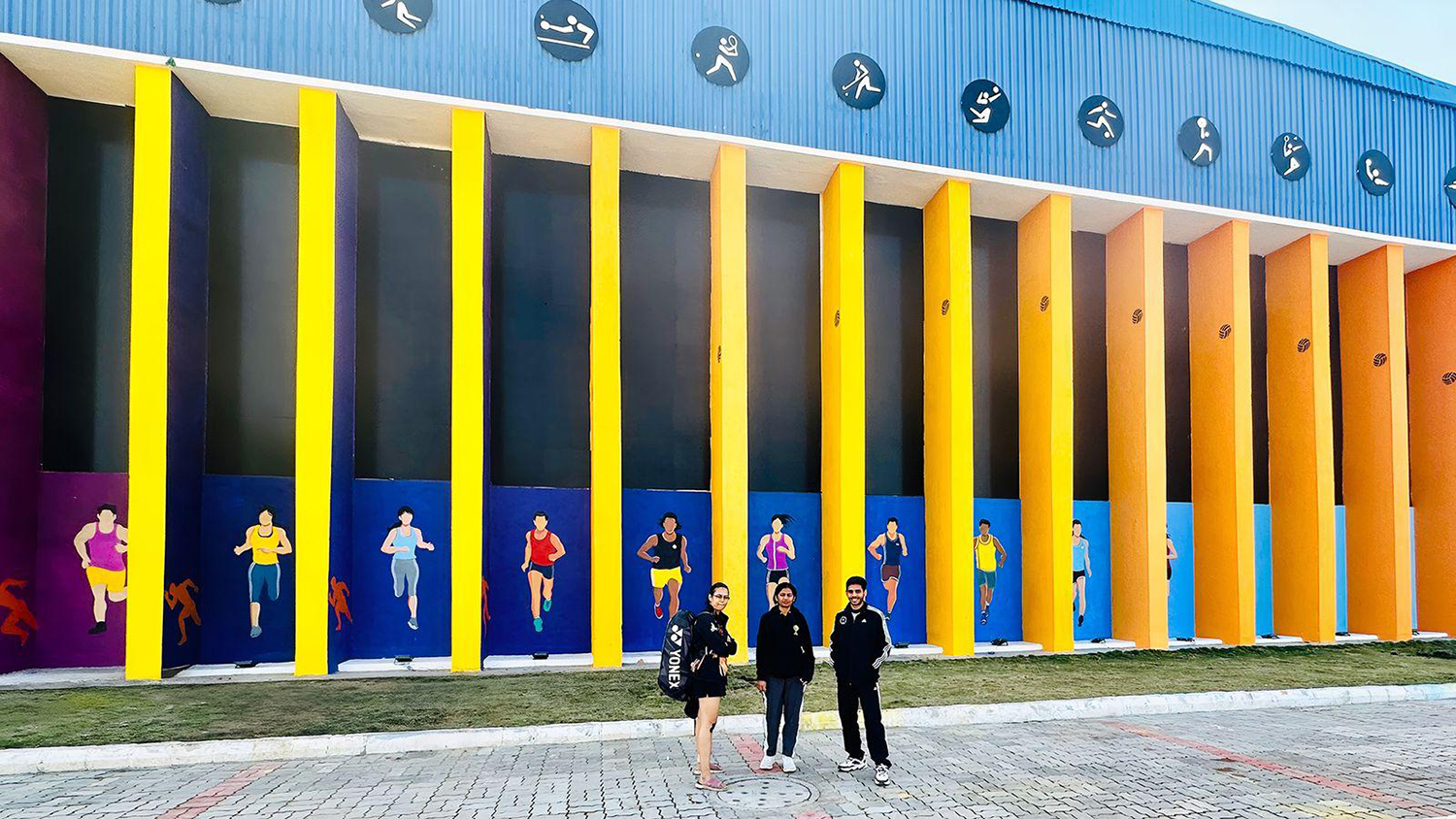 Yellow wayfinding columns, public plaza
